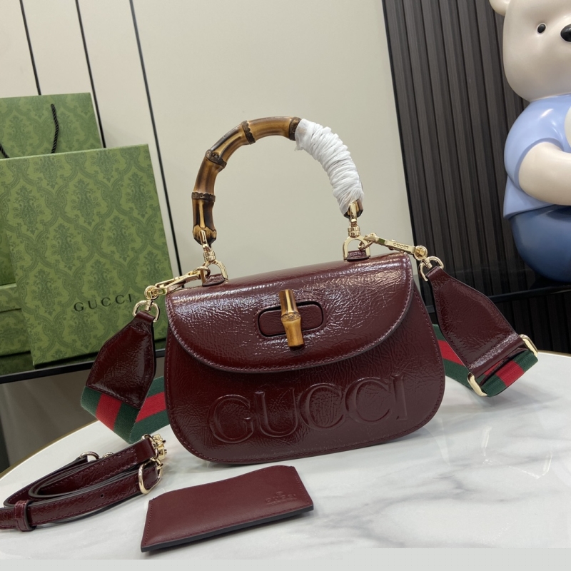 G*u*i top handle bags